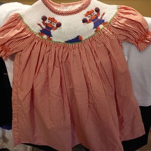 Size 6 Mos....SMOCKED CHEERLEADER DRESS..Orange and Blue.